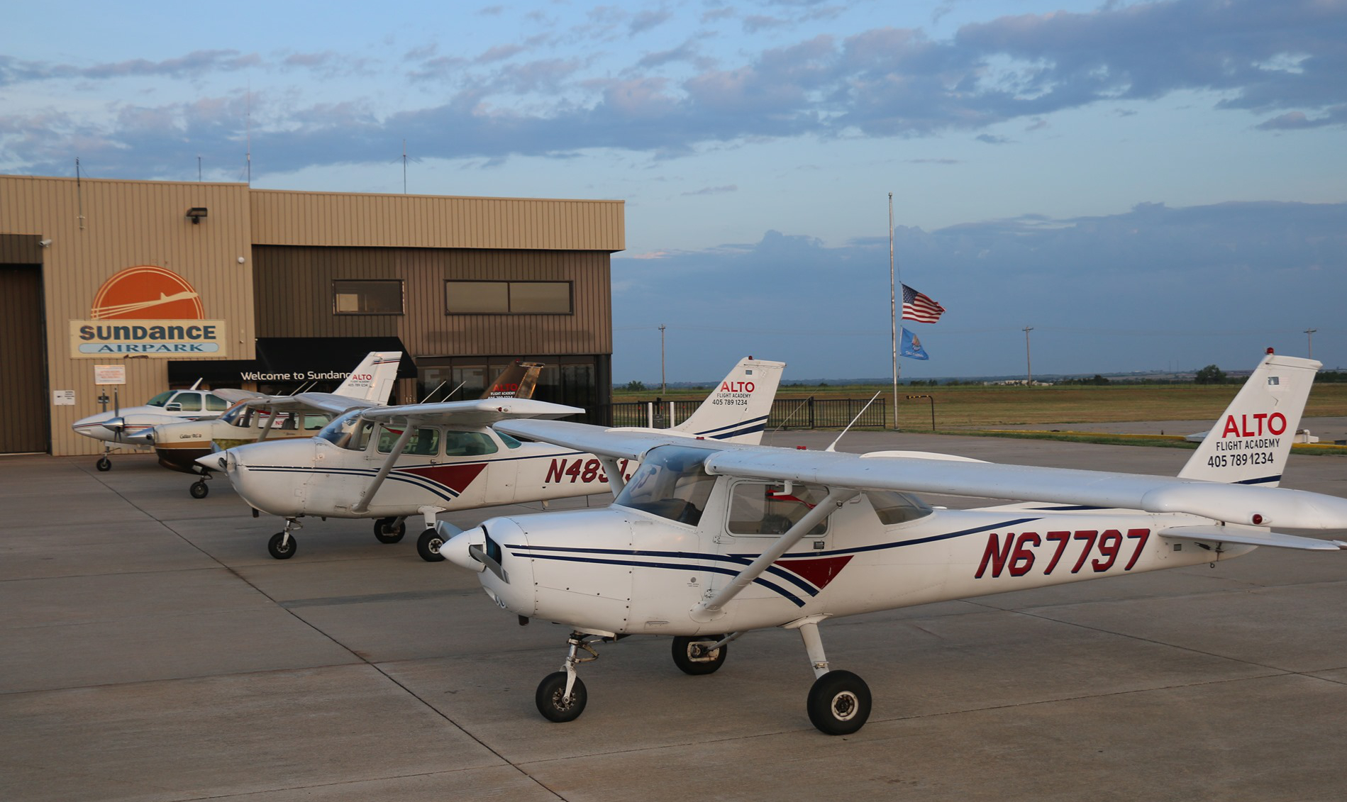 Active rental and flight training fleet of Cessna and Beechcraft airplanes lined up at Sundance Airport